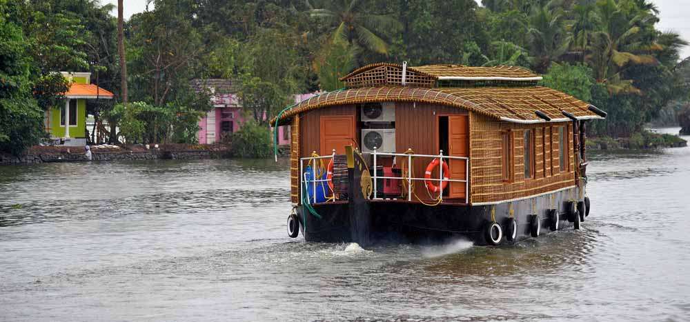 India, Kerala, Cochin, waterways rainswept houseboat