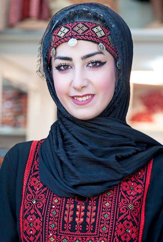 Madaba - local girl in traditional costume